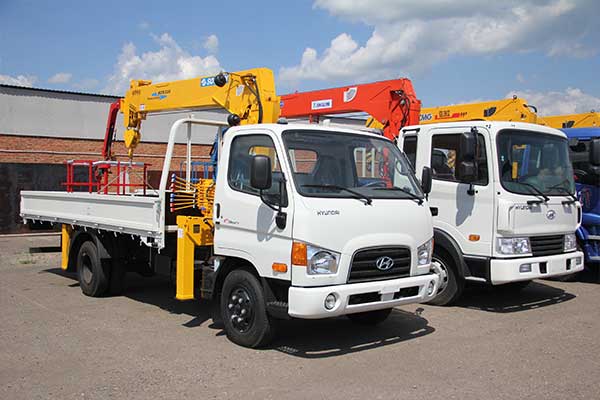 location camion grue avec chauffeur TP Plus à Lille, Lens, Douai, Amiens, Valenciennes